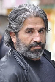 &Uuml;mit Okur