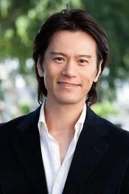 山口崇